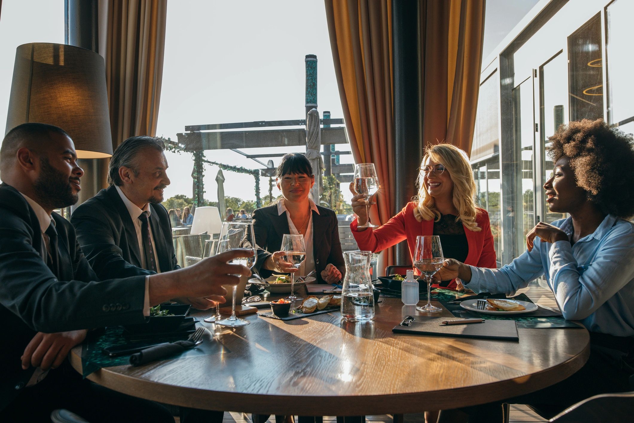 Guests toasting champagne at a VIP table